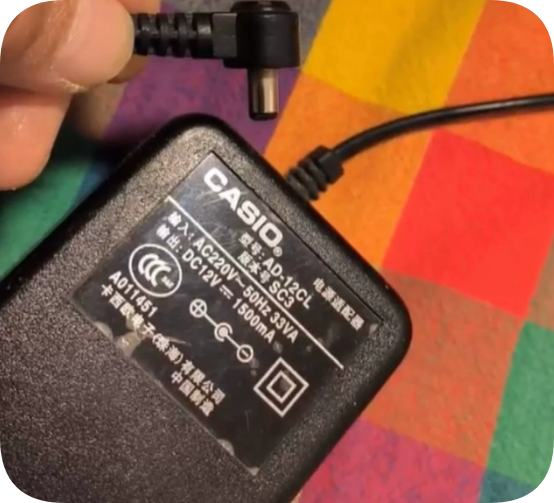 *Brand NEW* Suitable for CASIO AD-12CL SC3 Power Adapter AC220V 33VA DC12V1500mA Center
